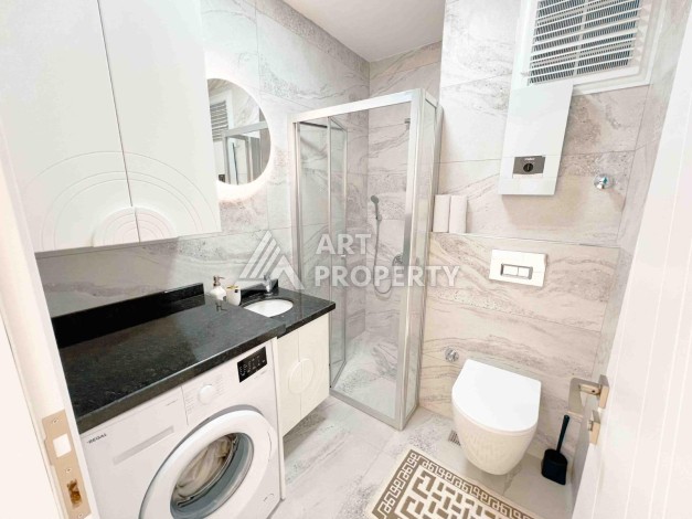 Светлая квартира 1+1 в районе Махмутлар, 50 кв.м. - Ракурс 8