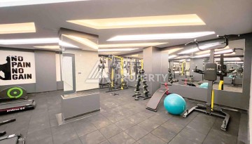 Светлая квартира 1+1 в районе Махмутлар, 50 кв.м. - Ракурс 10