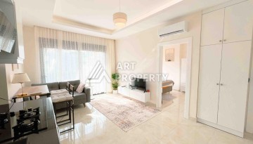 Светлая квартира 1+1 в районе Махмутлар, 50 кв.м. - Ракурс 11