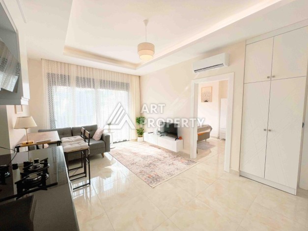 Светлая квартира 1+1 в районе Махмутлар, 50 кв.м. - Ракурс 10