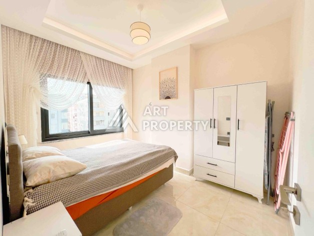 Светлая квартира 1+1 в районе Махмутлар, 50 кв.м. - Ракурс 12