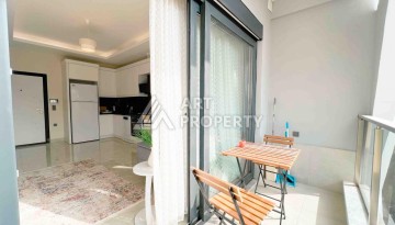 Светлая квартира 1+1 в районе Махмутлар, 50 кв.м. - Ракурс 16