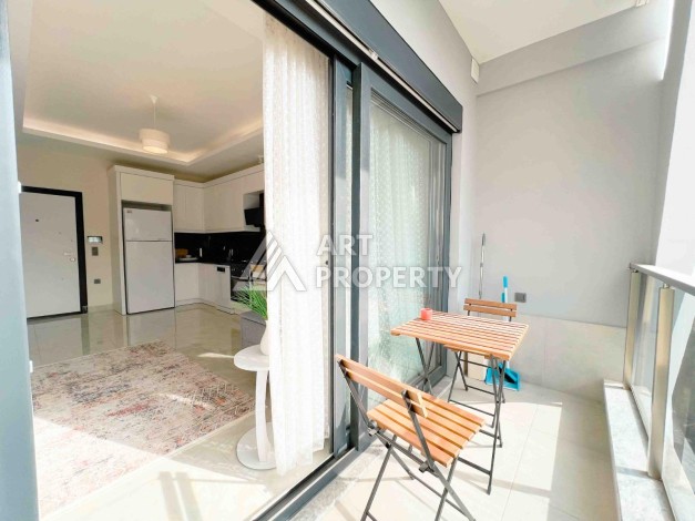 Светлая квартира 1+1 в районе Махмутлар, 50 кв.м. - Ракурс 15