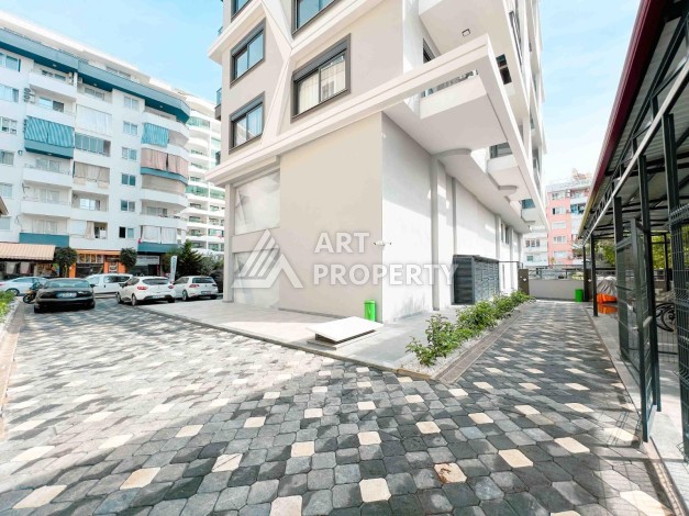 Светлая квартира 1+1 в районе Махмутлар, 50 кв.м. - Ракурс 16