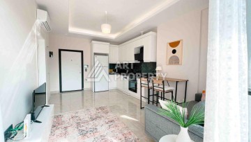 Светлая квартира 1+1 в районе Махмутлар, 50 кв.м. - Ракурс 19