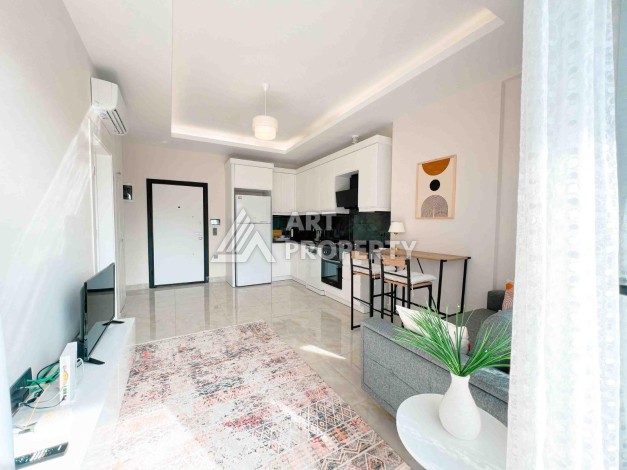 Светлая квартира 1+1 в районе Махмутлар, 50 кв.м. - Ракурс 18