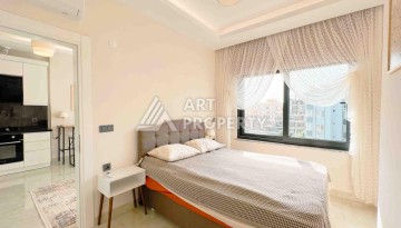 Светлая квартира 1+1 в районе Махмутлар, 50 кв.м. - Ракурс 21