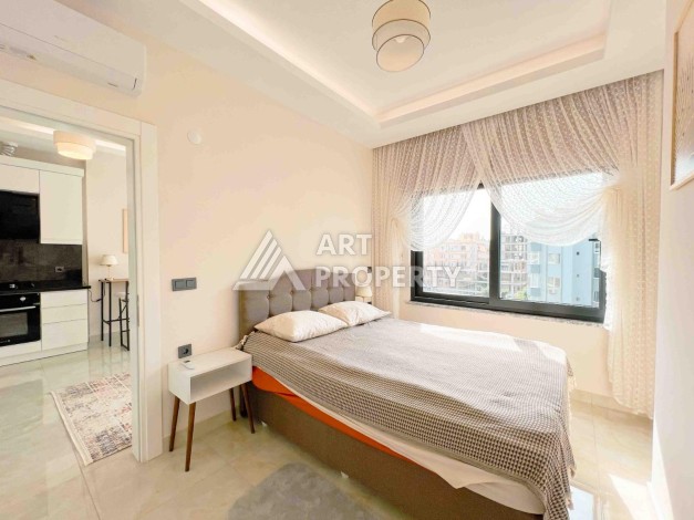 Светлая квартира 1+1 в районе Махмутлар, 50 кв.м. - Ракурс 20