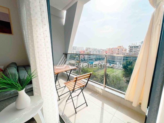 Светлая квартира 1+1 в районе Махмутлар, 50 кв.м. - Ракурс 21