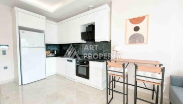 Светлая квартира 1+1 в районе Махмутлар, 50 кв.м. - Ракурс 25