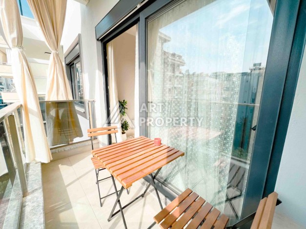 Светлая квартира 1+1 в районе Махмутлар, 50 кв.м. - Ракурс 25