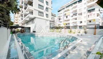 Светлая квартира 1+1 в районе Махмутлар, 50 кв.м. - Ракурс 29