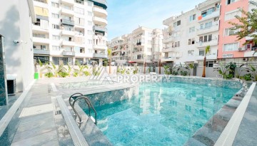 Светлая квартира 1+1 в районе Махмутлар, 50 кв.м. - Ракурс 30