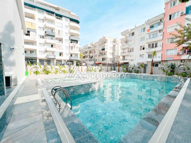 Светлая квартира 1+1 в районе Махмутлар, 50 кв.м. - Ракурс 29