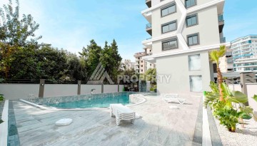 Светлая квартира 1+1 в районе Махмутлар, 50 кв.м. - Ракурс 34