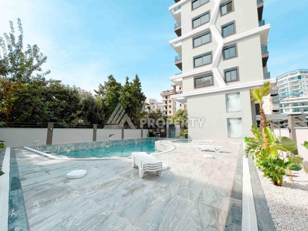 Светлая квартира 1+1 в районе Махмутлар, 50 кв.м. - Ракурс 33