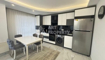 Квартира 1+1 с видом на море в центре Махмутлара - Ракурс 4