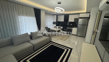 Квартира 1+1 с видом на море в центре Махмутлара - Ракурс 9