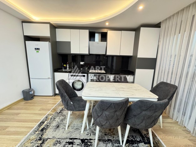 Квартира 1+1 в центре Махмутлара в современном комплексе 2023 года - Ракурс 11