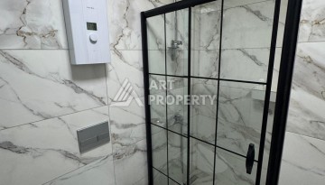 Квартира 1+1 в центре Махмутлара в современном комплексе 2023 года - Ракурс 17