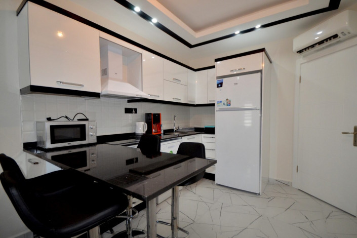 Двухкомнатная квартира в новом комплексе в курортном городе Алания, всего в 100 метрах от Средиземного моря, 65м2 - Ракурс 2