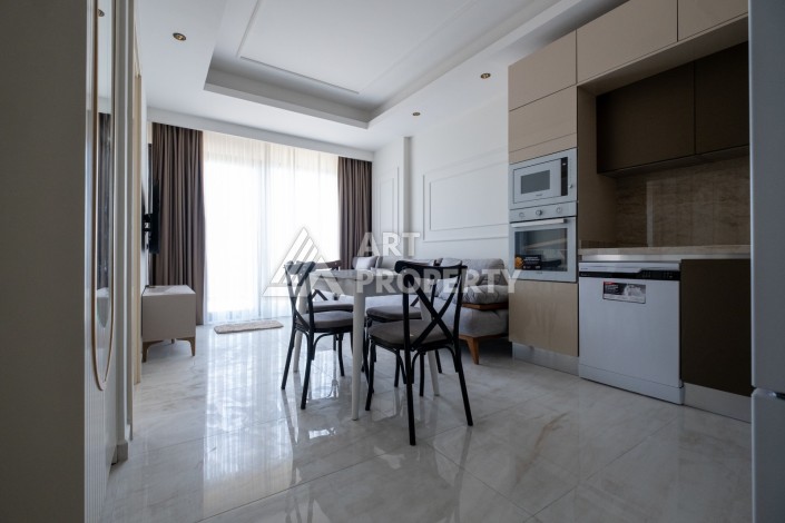 Квартира 1+1 на первой береговой линии с прямым видом на море в Махмутларе - Ракурс 13