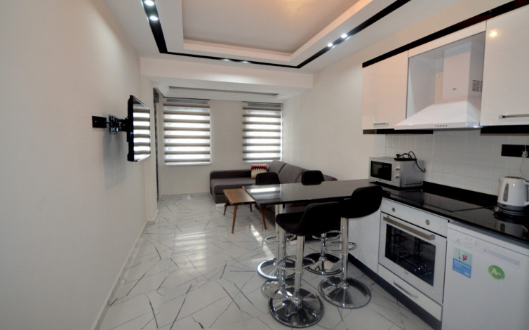 Двухкомнатная квартира в новом комплексе в курортном городе Алания, всего в 100 метрах от Средиземного моря, 65м2 - Ракурс 4