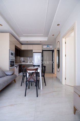 Квартира 1+1 на первой береговой линии с прямым видом на море в Махмутларе - Ракурс 18