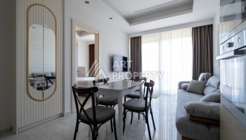 Квартира 1+1 на первой береговой линии с прямым видом на море в Махмутларе - Ракурс 24