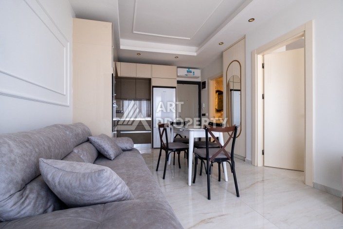 Квартира 1+1 на первой береговой линии с прямым видом на море в Махмутларе - Ракурс 27