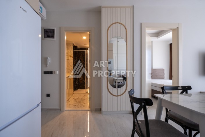 Квартира 1+1 на первой береговой линии с прямым видом на море в Махмутларе - Ракурс 30