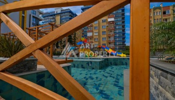 Квартира 1+1 на первой береговой линии с прямым видом на море в Махмутларе - Ракурс 33