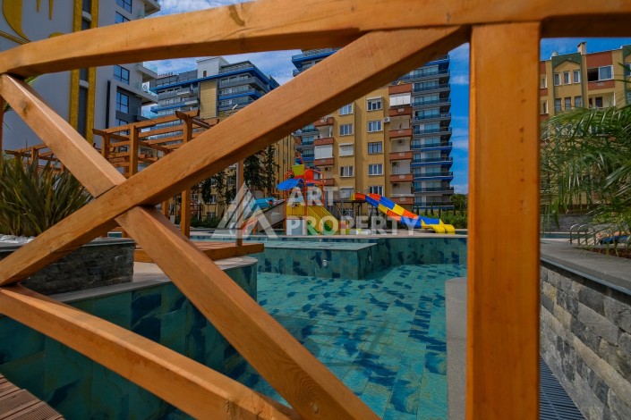 Квартира 1+1 на первой береговой линии с прямым видом на море в Махмутларе - Ракурс 32