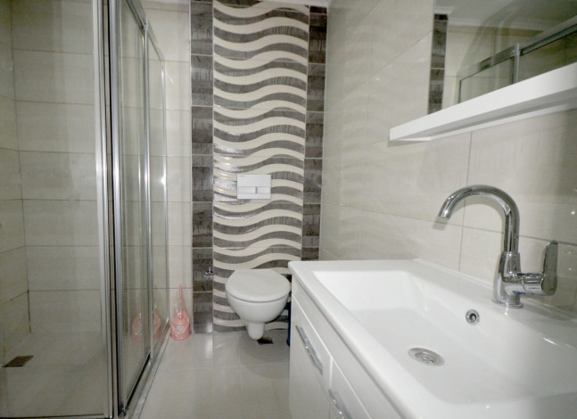 Двухкомнатная квартира в новом комплексе в курортном городе Алания, всего в 100 метрах от Средиземного моря, 65м2 - Ракурс 6