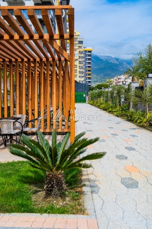 Квартира 1+1 на первой береговой линии с прямым видом на море в Махмутларе - Ракурс 46