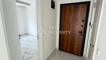 Недорогая квартира 1+1 в новом доме — отличный старт для недвижимости в Турции - Ракурс 7