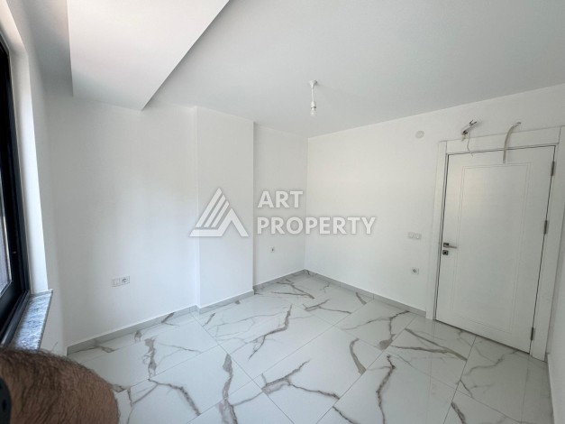 Недорогая квартира 1+1 в новом доме — отличный старт для недвижимости в Турции - Ракурс 7