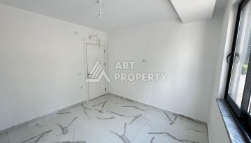 Недорогая квартира 1+1 в новом доме — отличный старт для недвижимости в Турции - Ракурс 9