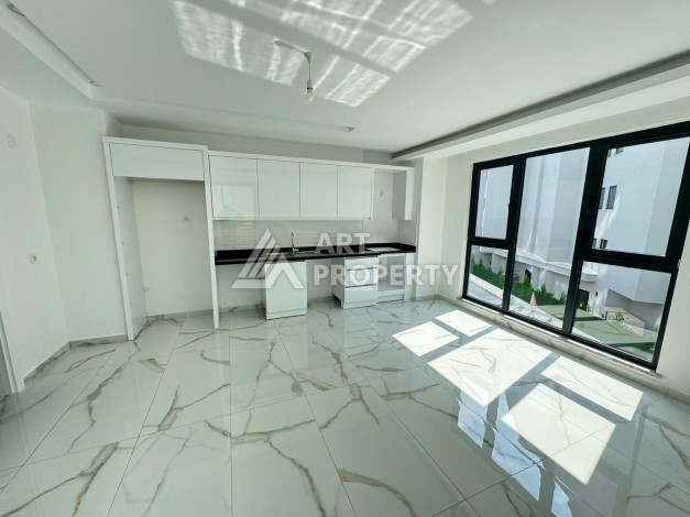 Недорогая квартира 1+1 в новом доме — отличный старт для недвижимости в Турции - Ракурс 9