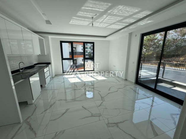 Недорогая квартира 1+1 в новом доме — отличный старт для недвижимости в Турции - Ракурс 10