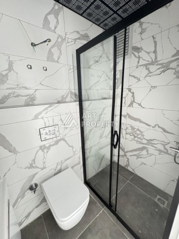 Недорогая квартира 1+1 в новом доме — отличный старт для недвижимости в Турции - Ракурс 11