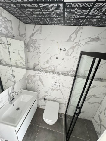 Недорогая квартира 1+1 в новом доме — отличный старт для недвижимости в Турции - Ракурс 12