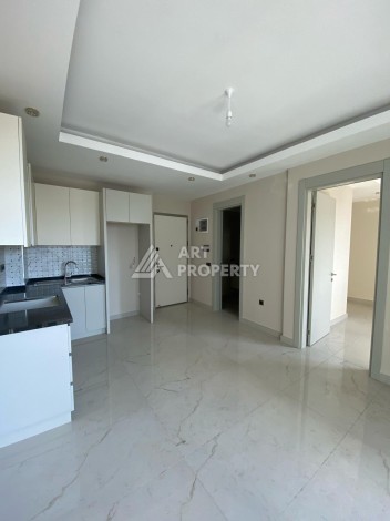 Новая квартира 1+1 на улице Барбароса в Махмутларе, вторая линия от моря - Ракурс 3