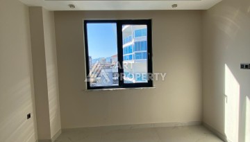 Новая квартира 1+1 на улице Барбароса в Махмутларе, вторая линия от моря - Ракурс 6