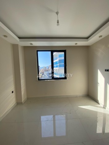 Новая квартира 1+1 на улице Барбароса в Махмутларе, вторая линия от моря - Ракурс 5