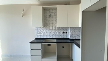 Новая квартира 1+1 на улице Барбароса в Махмутларе, вторая линия от моря - Ракурс 7