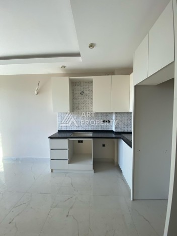 Новая квартира 1+1 на улице Барбароса в Махмутларе, вторая линия от моря - Ракурс 6