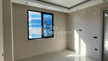 Новая квартира 1+1 на улице Барбароса в Махмутларе, вторая линия от моря - Ракурс 8