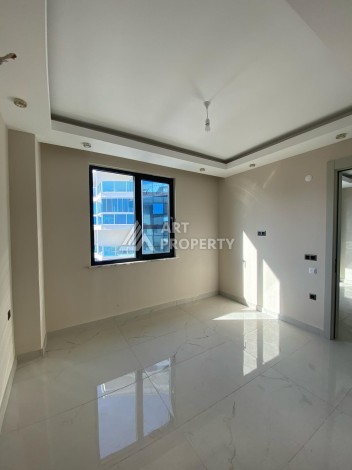 Новая квартира 1+1 на улице Барбароса в Махмутларе, вторая линия от моря - Ракурс 7