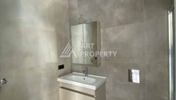 Новая квартира 1+1 на улице Барбароса в Махмутларе, вторая линия от моря - Ракурс 9